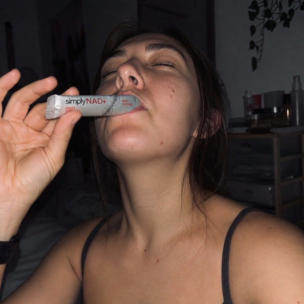 simplyNAD+ liquid NAD+ shot packet in an everyday setting