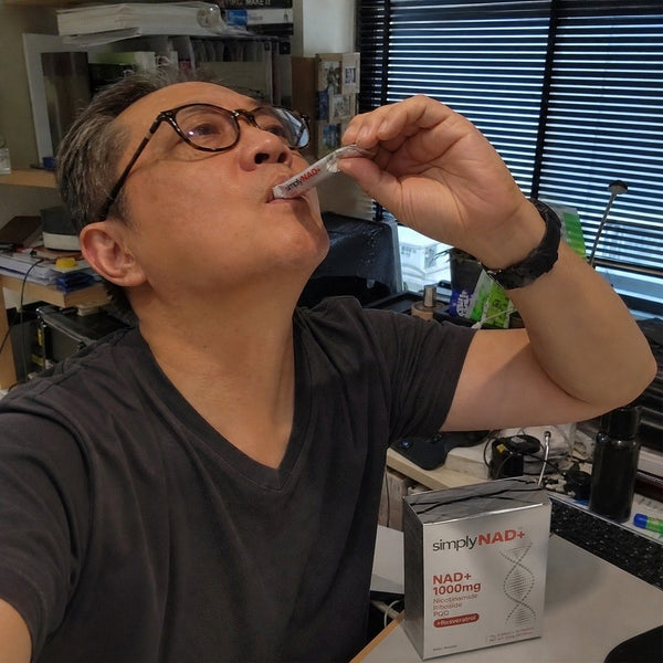 simplyNAD+ liquid NAD+ shot packet in an everyday setting