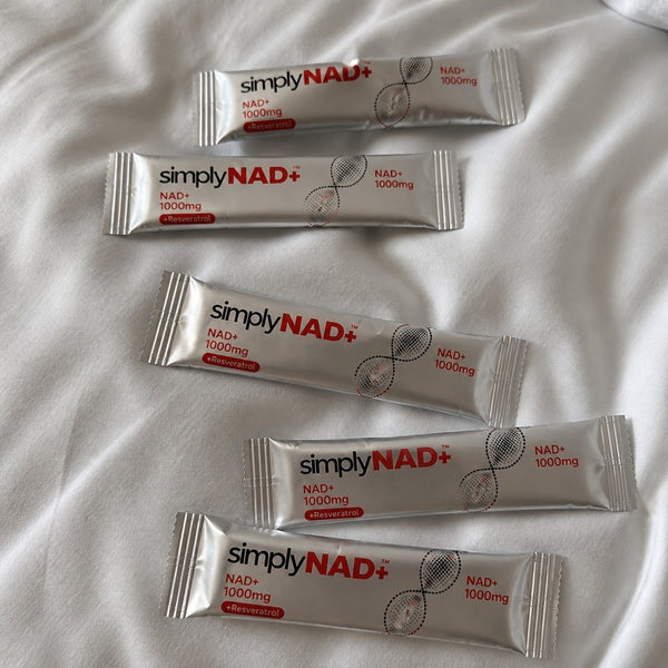 simplyNAD+ liquid NAD+ shot packet in an everyday setting